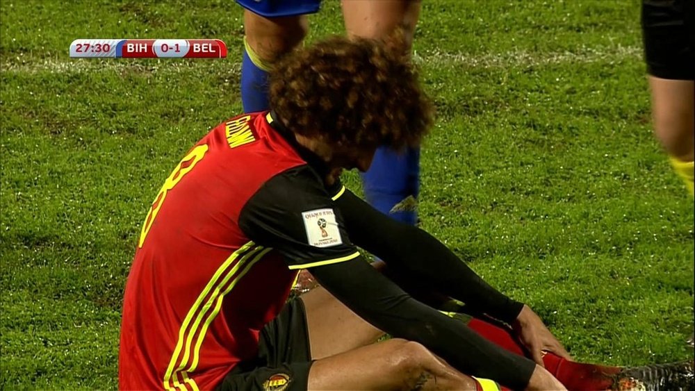 Fellaini limps out of Belgium match. Twitter/Movistar+