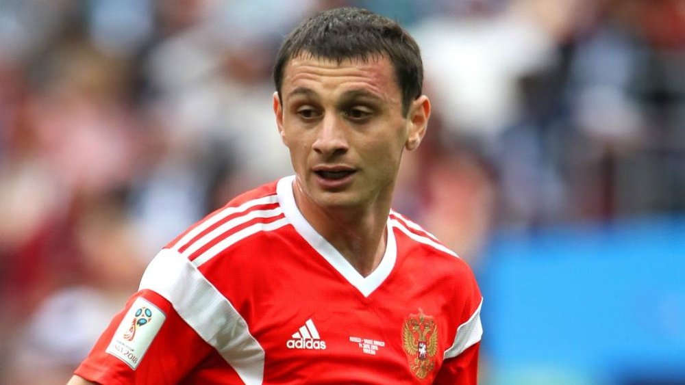 Dzagoev limped off in the opening game. GOAL