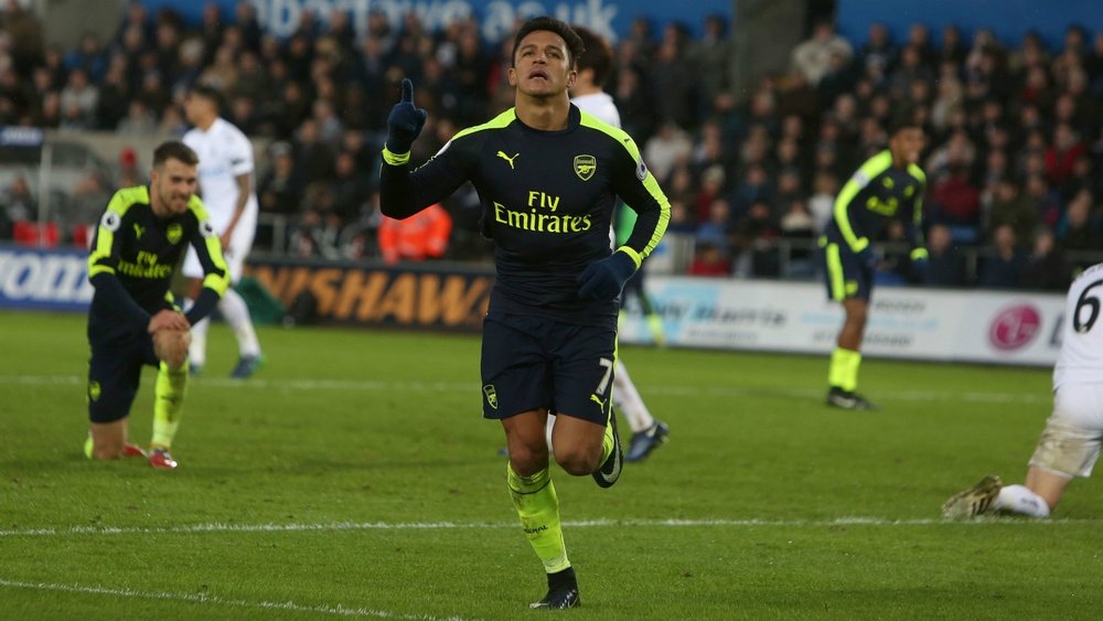 Alexis Sanchez celebrates his goal against Swansea. Goal