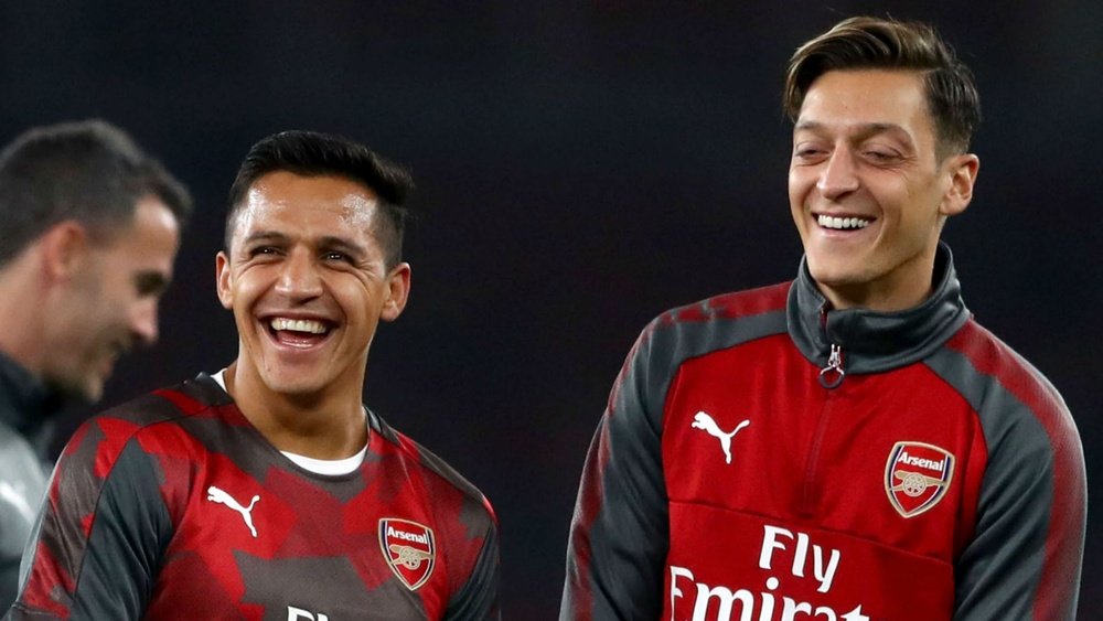 Mertesacker claims Mesut Ozil and Alexis Sanchez remain committed to Arsenal. GOAL