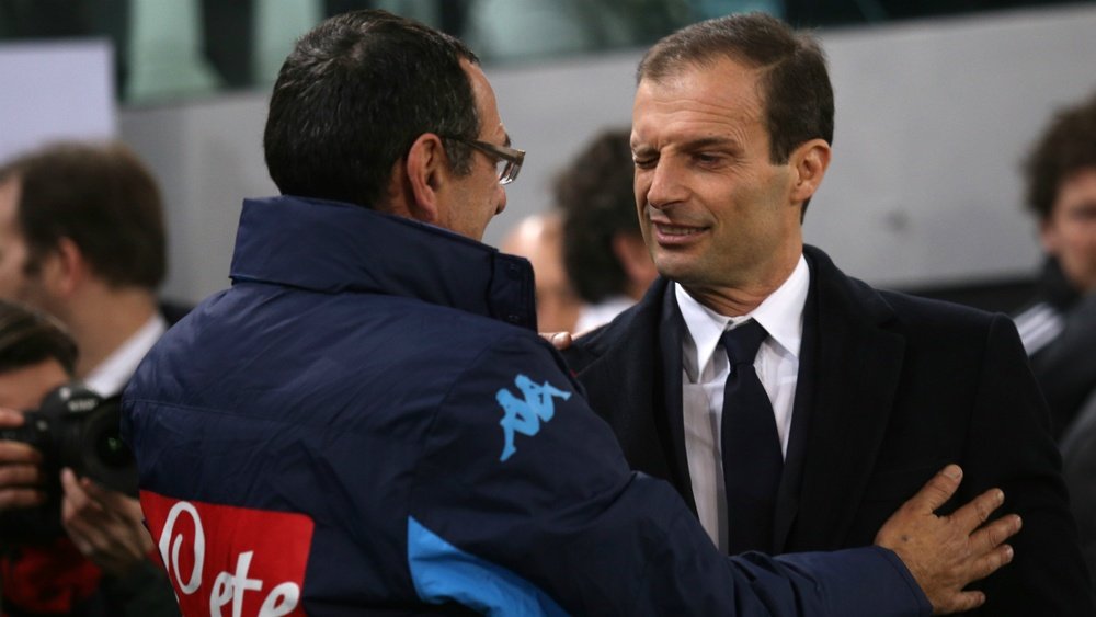 Massimiliano Allegri (right) saluting Mauro Sarri before a match between Juventus and Napoli. Goal