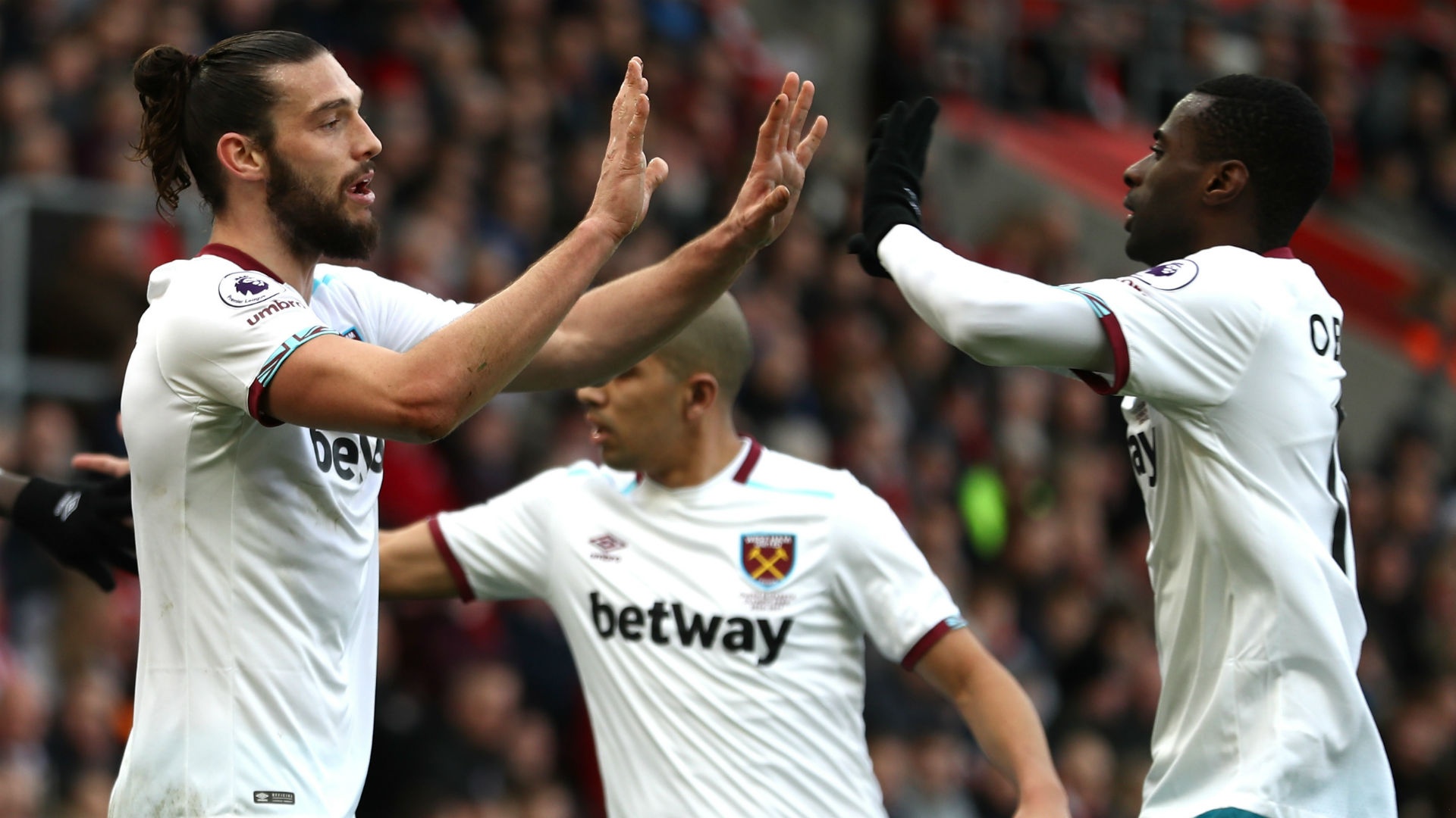 West Ham's Andy Carroll and Pedro Obiang. Goal