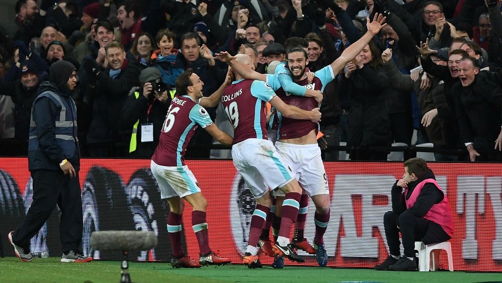 Andy Carroll celebrates scoring his stunning volley. Goal