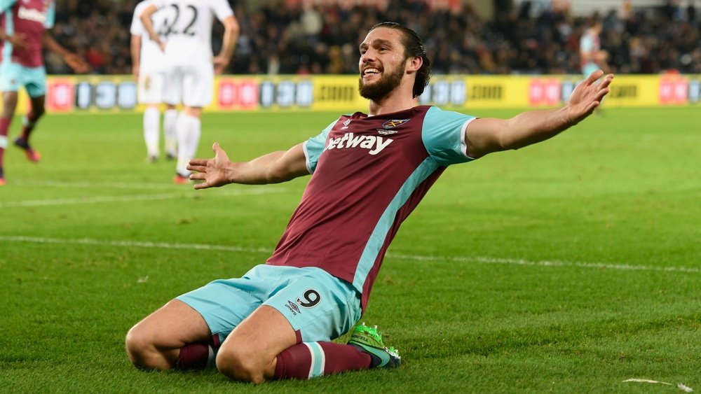 Andy Carroll will miss. Goal
