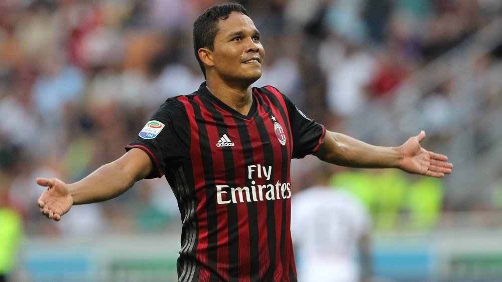 Carlos Bacca with his arms opened. Goal