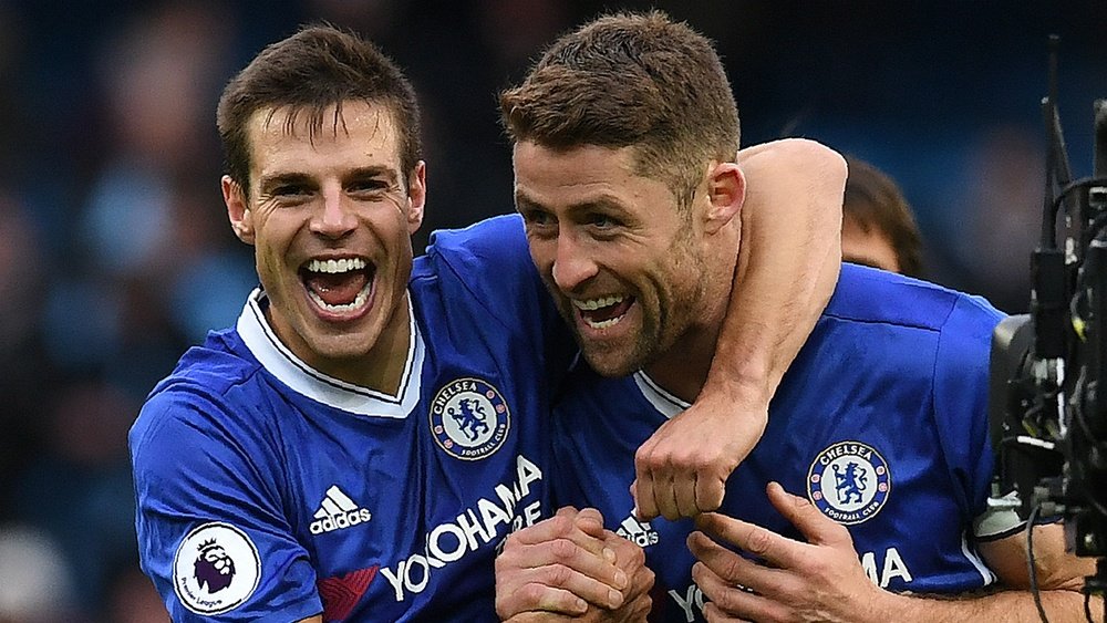 Cahill (R) wants Chelsea to record 12 wins in a row. Goal