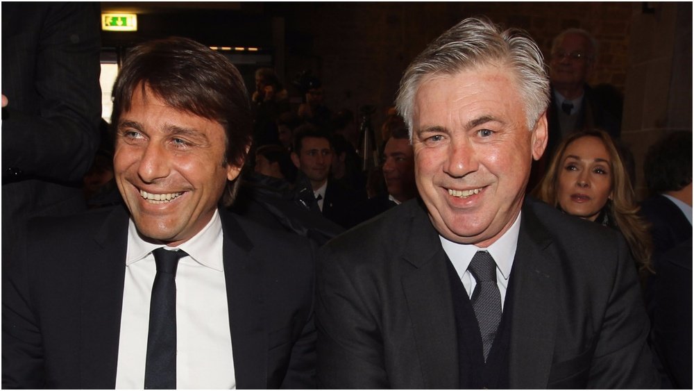 Conte and Ancelotti sitting next to each other. Goal
