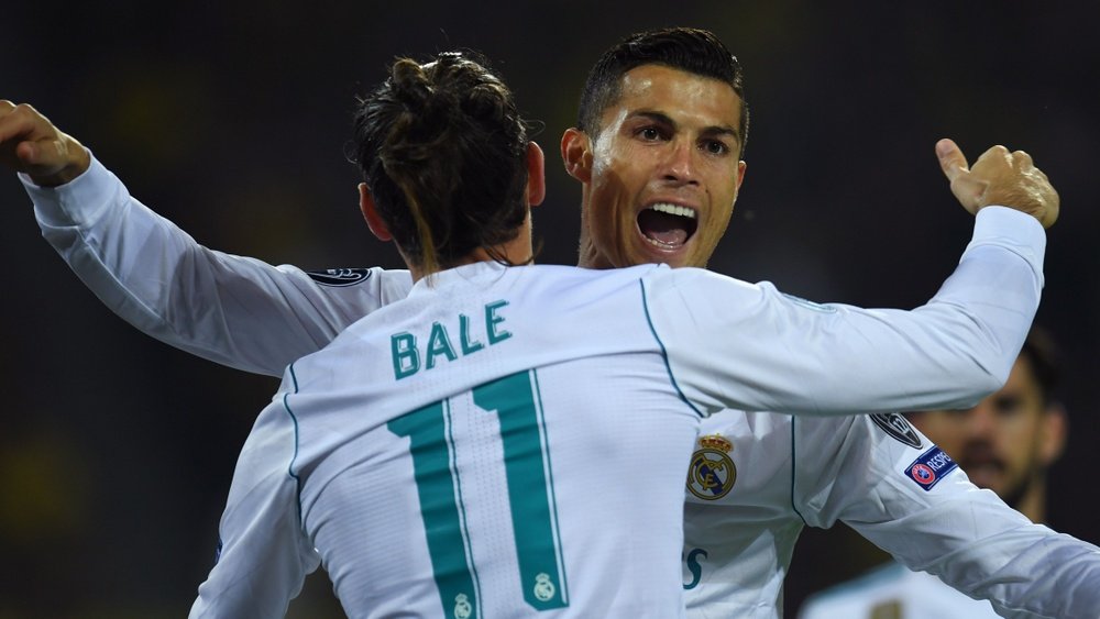 Os homens da partida, celebrando: Ronaldo e Bale. Goal