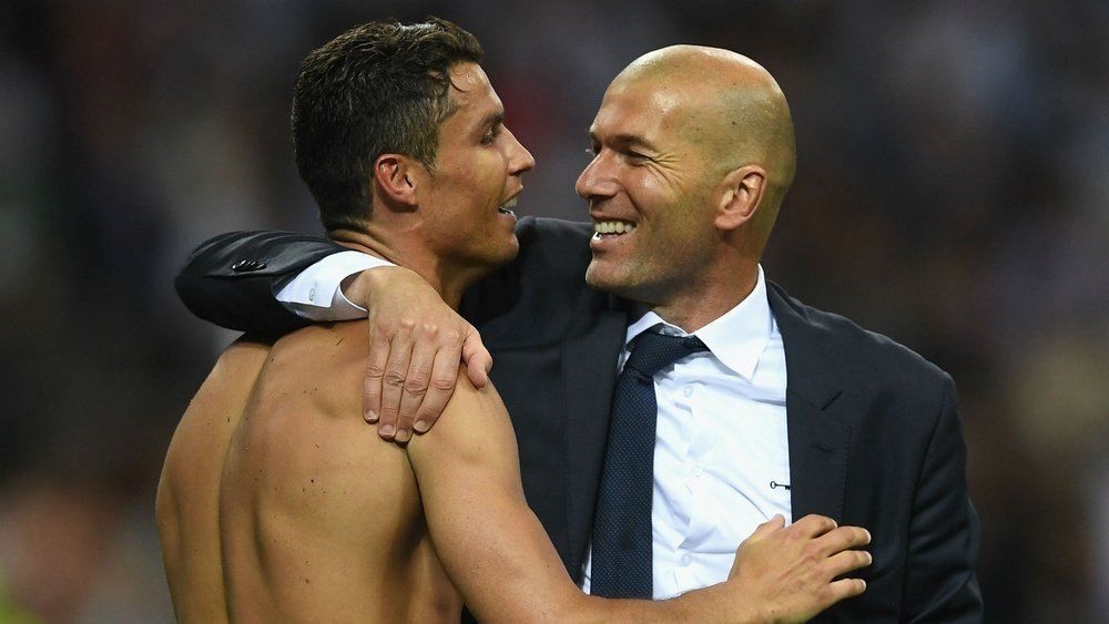 Cristiano Ronaldo and Zinedine Zidane celebrate Madrid's Champions League win. Goal