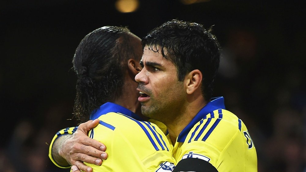 Didier Drogba and Diego Cost a hugging. Goal
