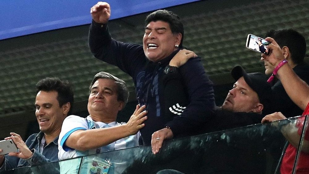 Maradona receives treatment after Argentina's dramatic win. Goal