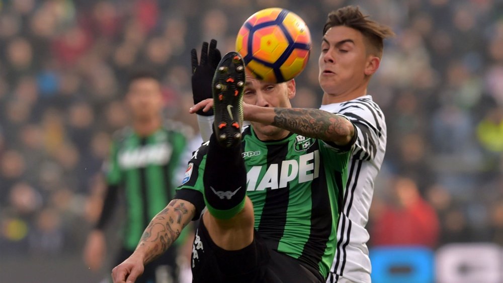 Paulo Dybala (right) during the clash against Sassuolo. Goal
