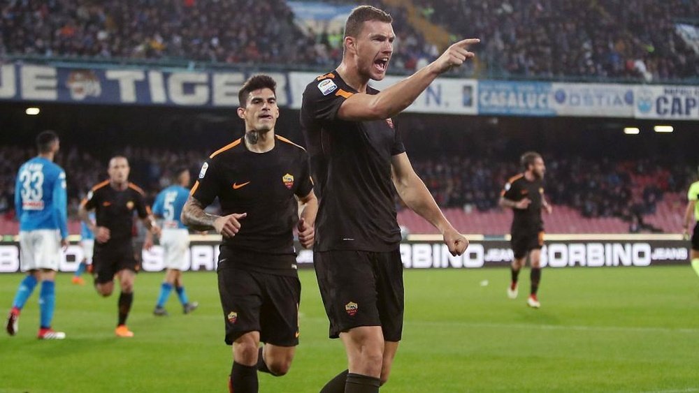 Dzeko scored twice as Roma came from behind to beat Napoli. AFP