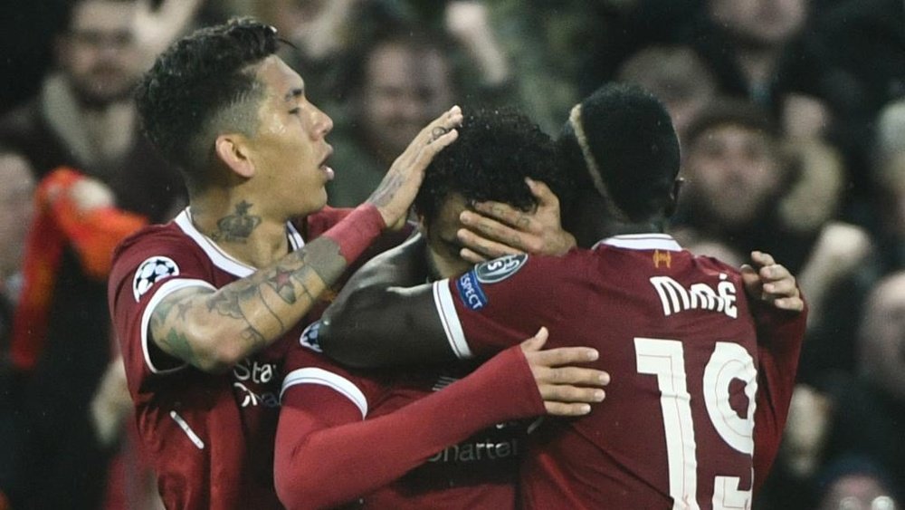 O inusitado, eficiente e encantador trio de ataque do Liverpool.Goal