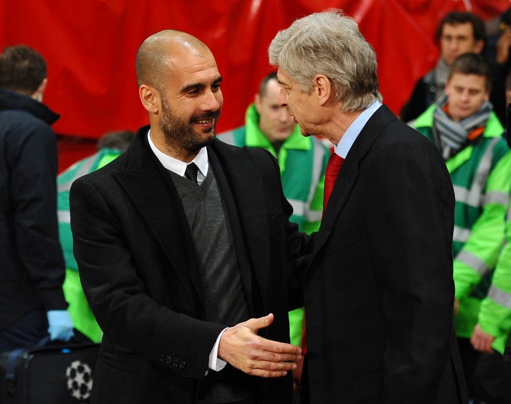 Guardiola (L) and Wenger will go head-to head on Sunday. Goal