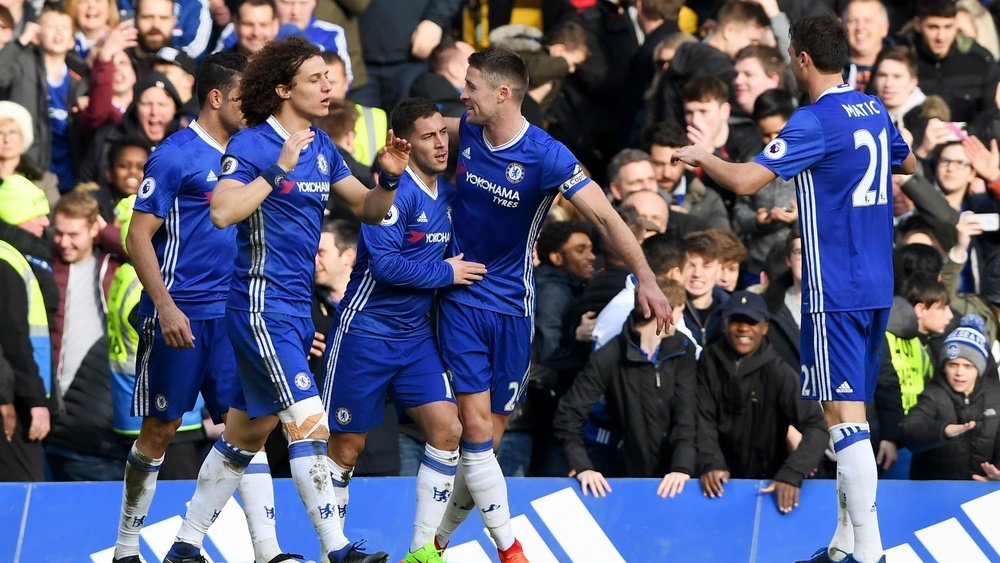 Les joueurs du Chelsea célèbrent leur victoire face à Arsenal en Premier League. AFP