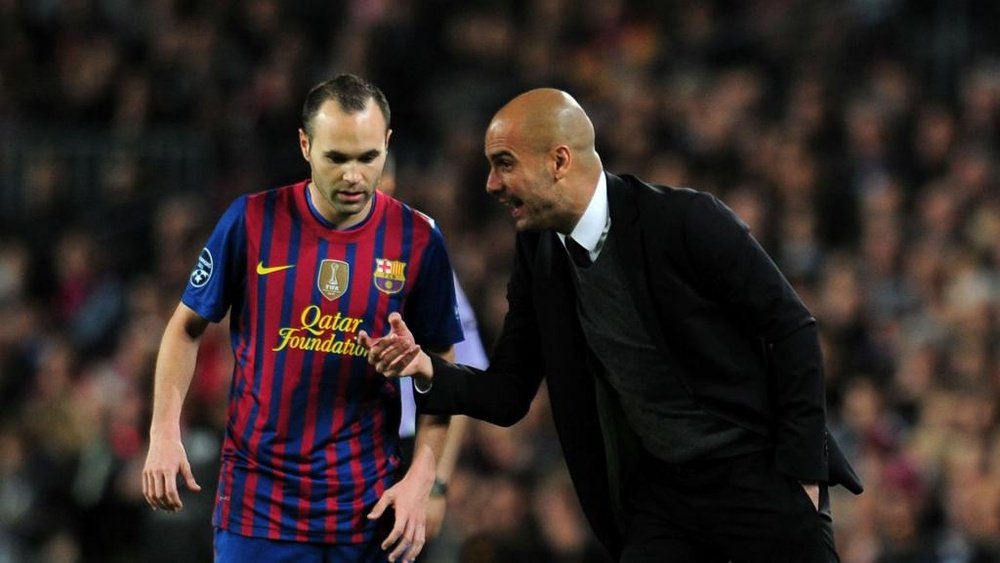 Iniesta and Guardiola enjoyed great success together at Barcelona. GOAL