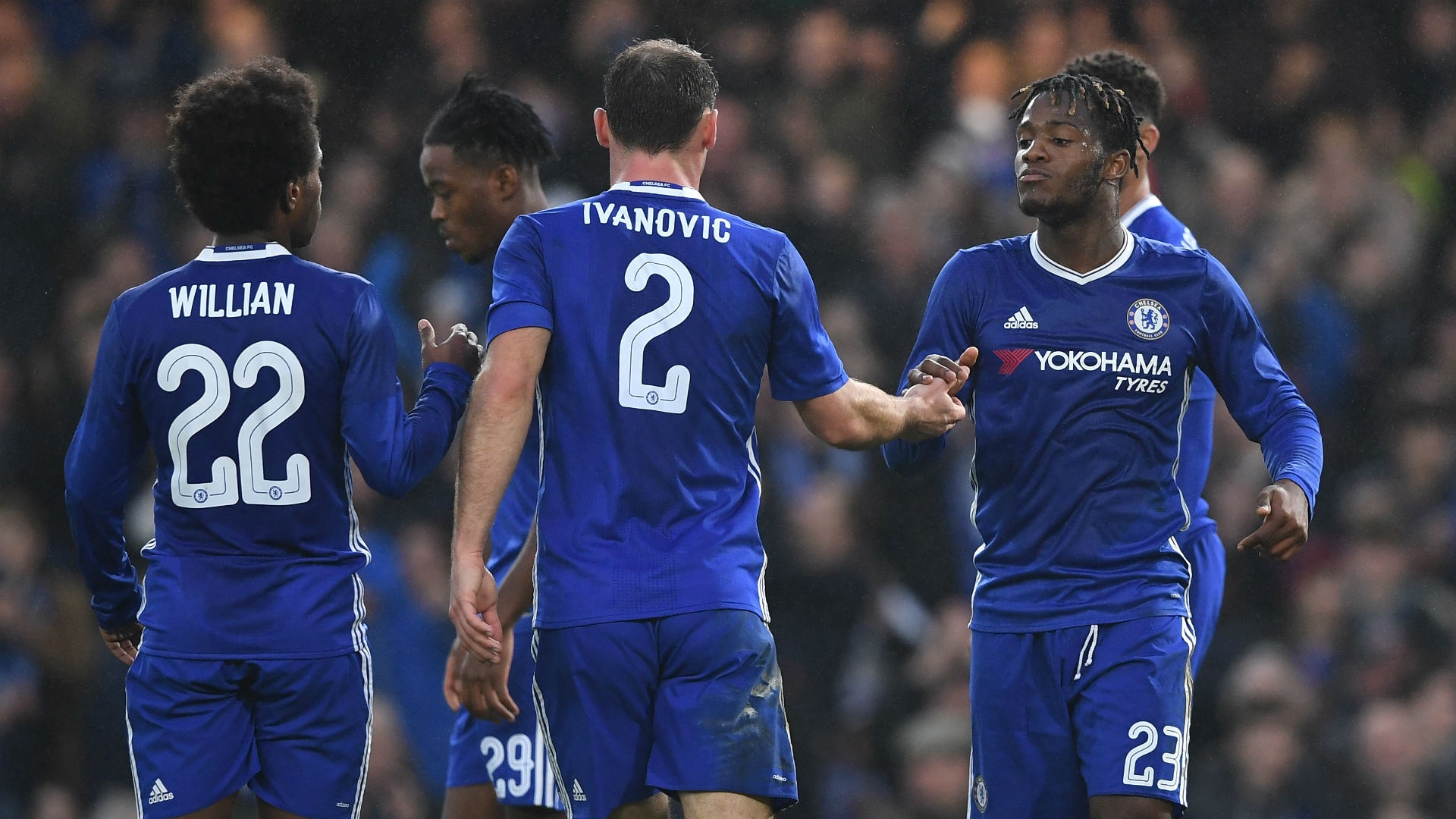 Chelsea players celebrating. Goal