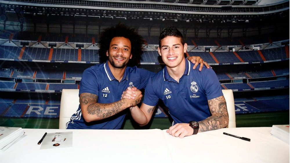 James et Marcelo lors de la signature d'autographes du Real Madrid à Valence. AFP