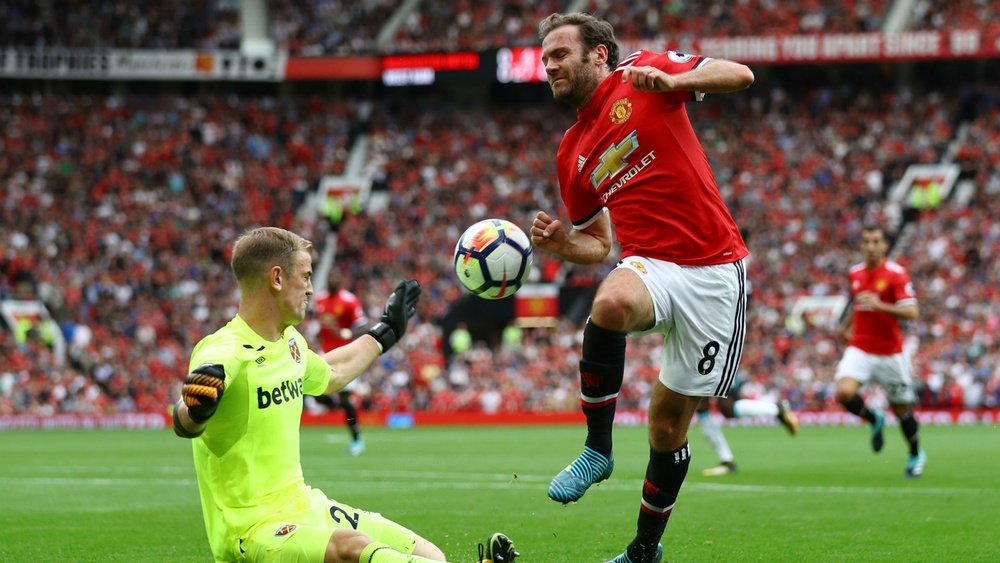 Juan Mata was delighted by United's 4-0 win over West Ham. GOAL