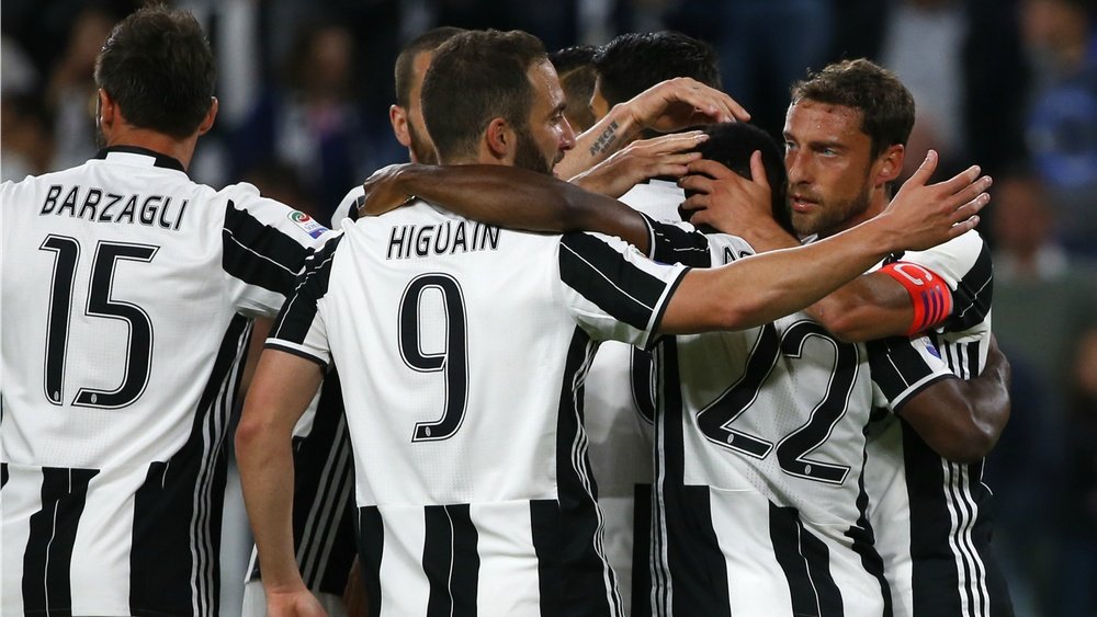Les joueurs de la Juventus qui célébrent la victoire contre Genoa en Serie A. AFP