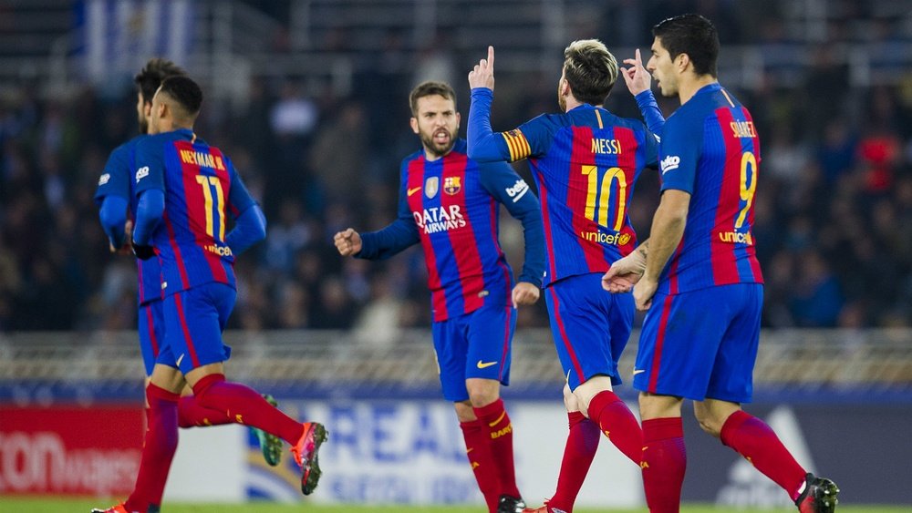 Messi celebrates scoring against Real Sociedad. Goal