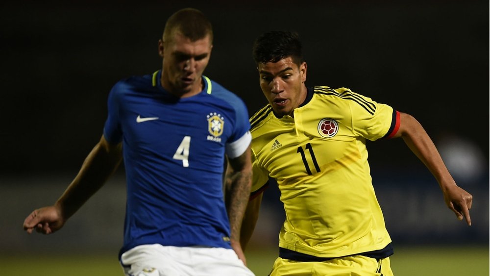 Lyanco (left) in action with Brazil's under-20 national team. Goal