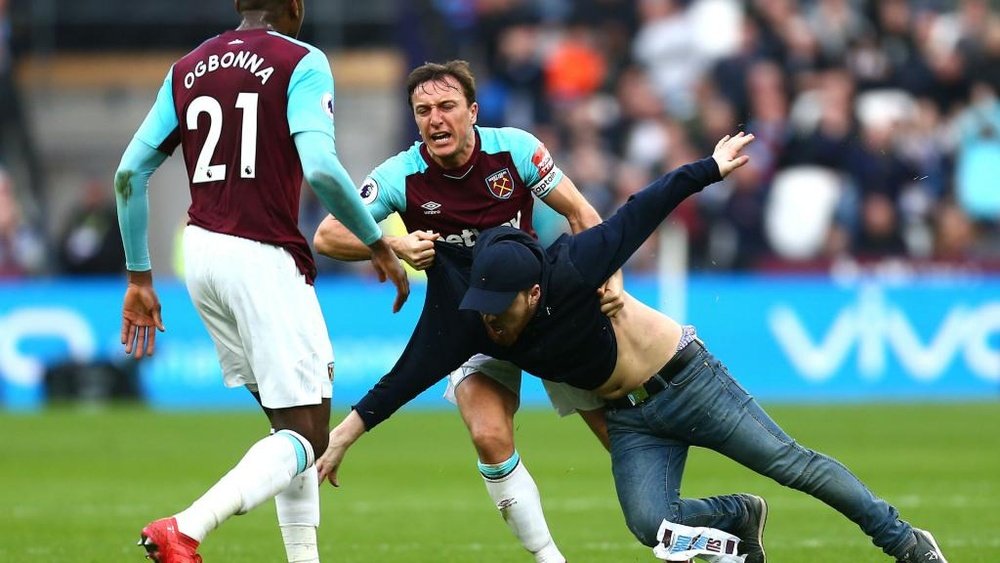 Noble clashed with a fan in the second half. GOAL