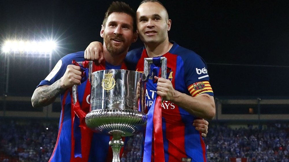 Iniesta wants Messi to follow his lead by signing a new contract at Barcelona. GOAL