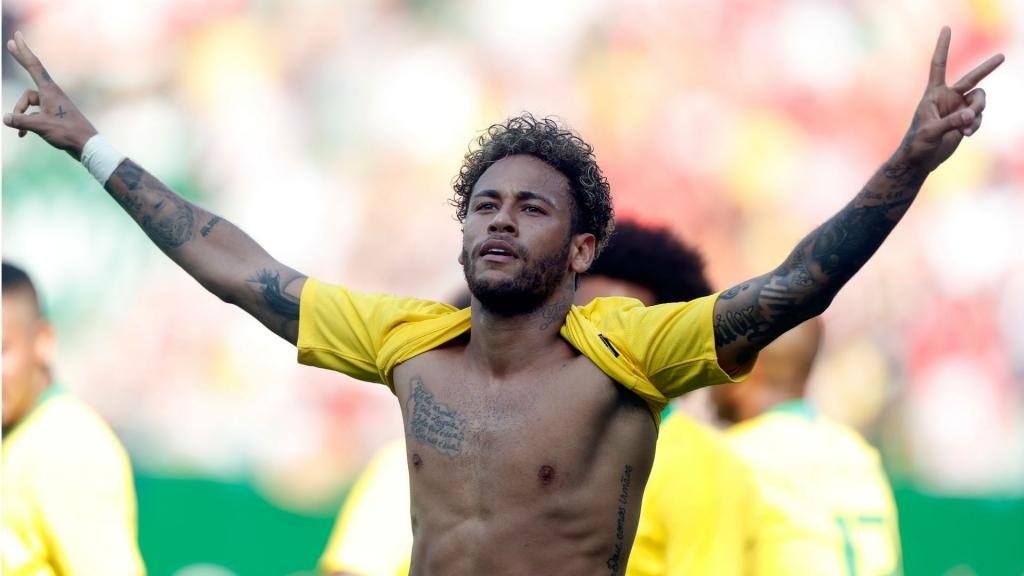 Jogador que mais apanhou nos amistosos pré-Copa, Neymar se mostra pronto para o Mundial