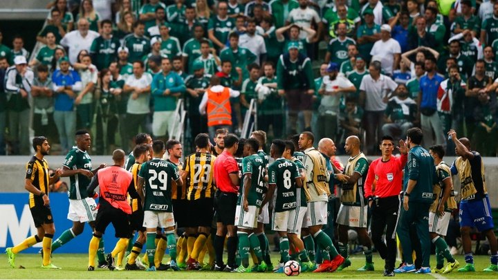 Melo among four suspended after Penarol-Palmeiras brawl