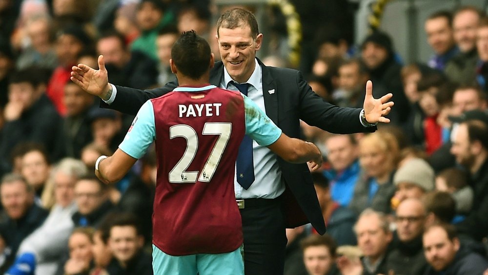 Payet and Bilic hugging. Goal