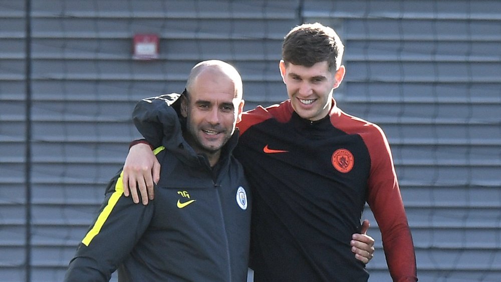 Pep Guardiola and John Stones. Goal