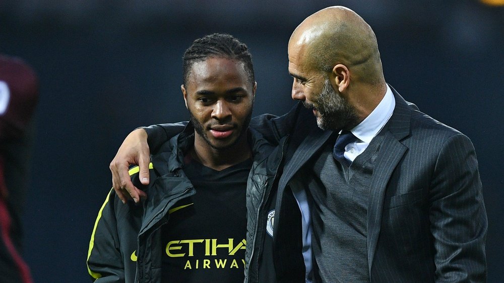 Sterling (L) has praised the influence of Pep Guardiola. Goal