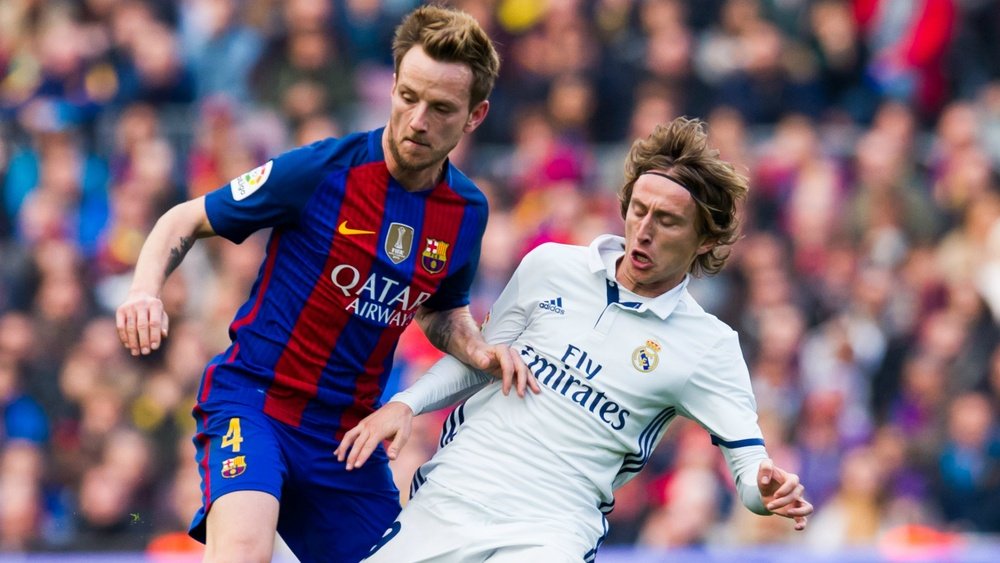 Modric hopes he has to console Rakitic after El Clasico. AFP