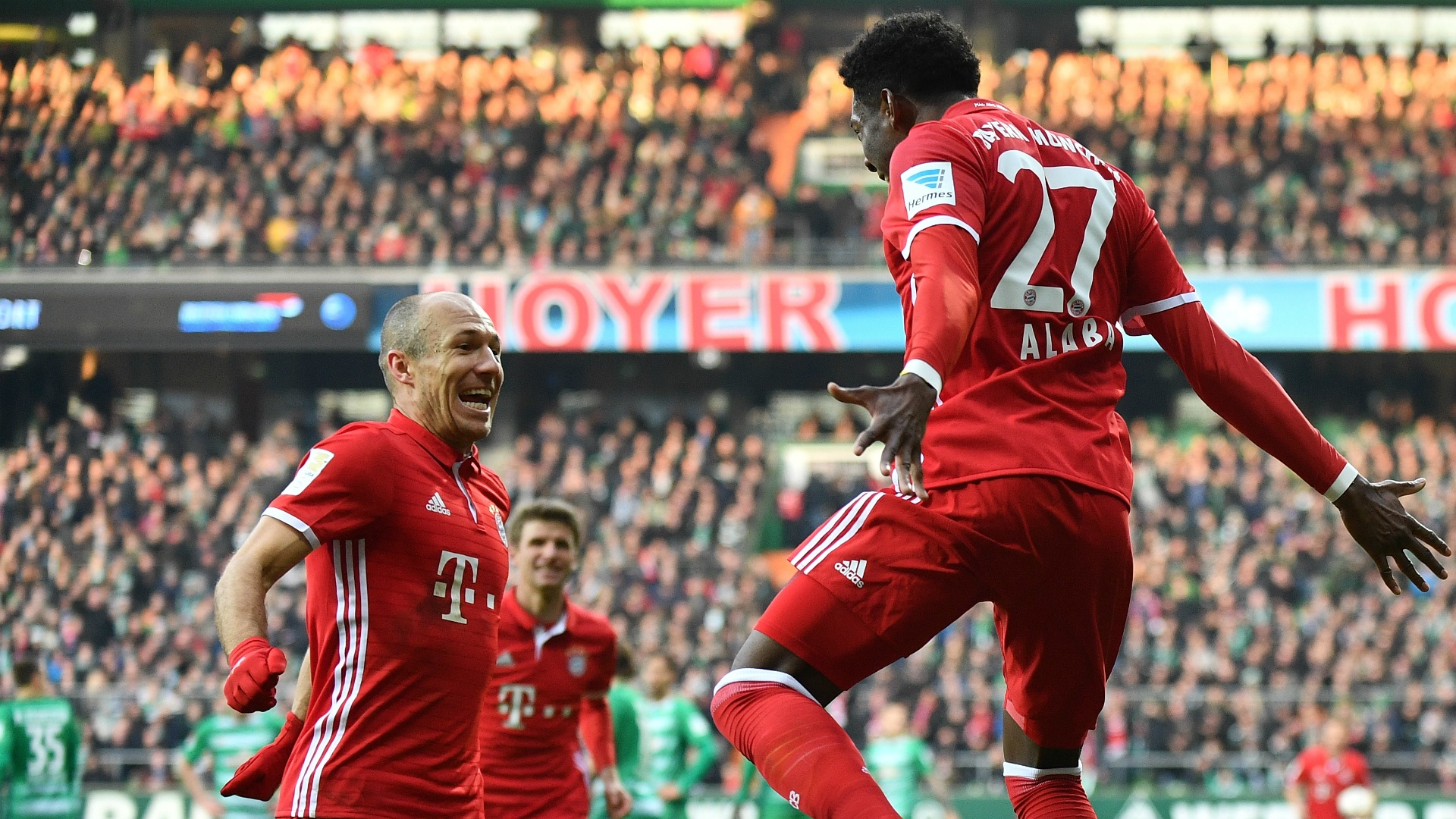 Bayern's Robben and Alaba celebrating. Goal