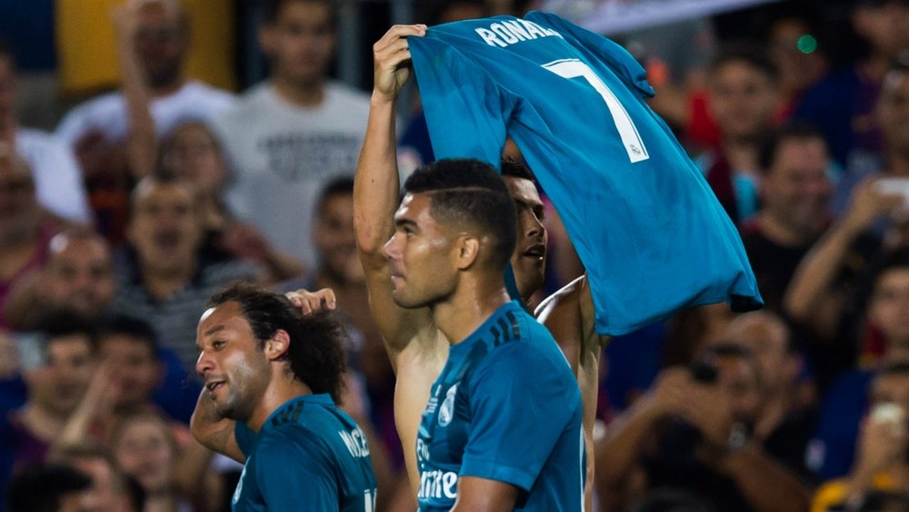 Ronaldo imitated Messi's iconic goal celebration. GOAL
