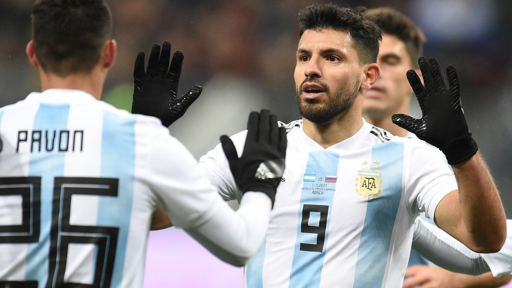 Aguero moves past Maradona but wants more from Argentina