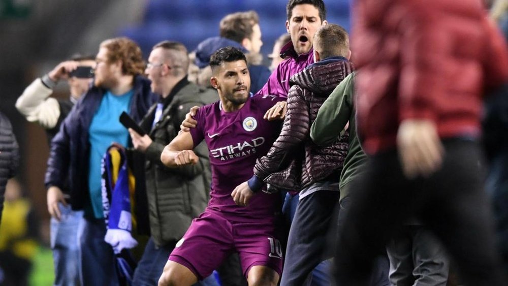 Aguero lashes out at fan as tempers flare after Wigan stun Man City
