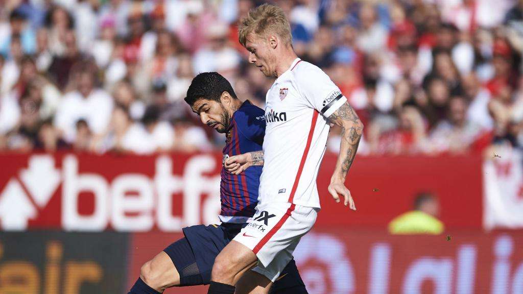 Sevilla's Kjaer joins Milan on loan after ending Atalanta spell. GOAL