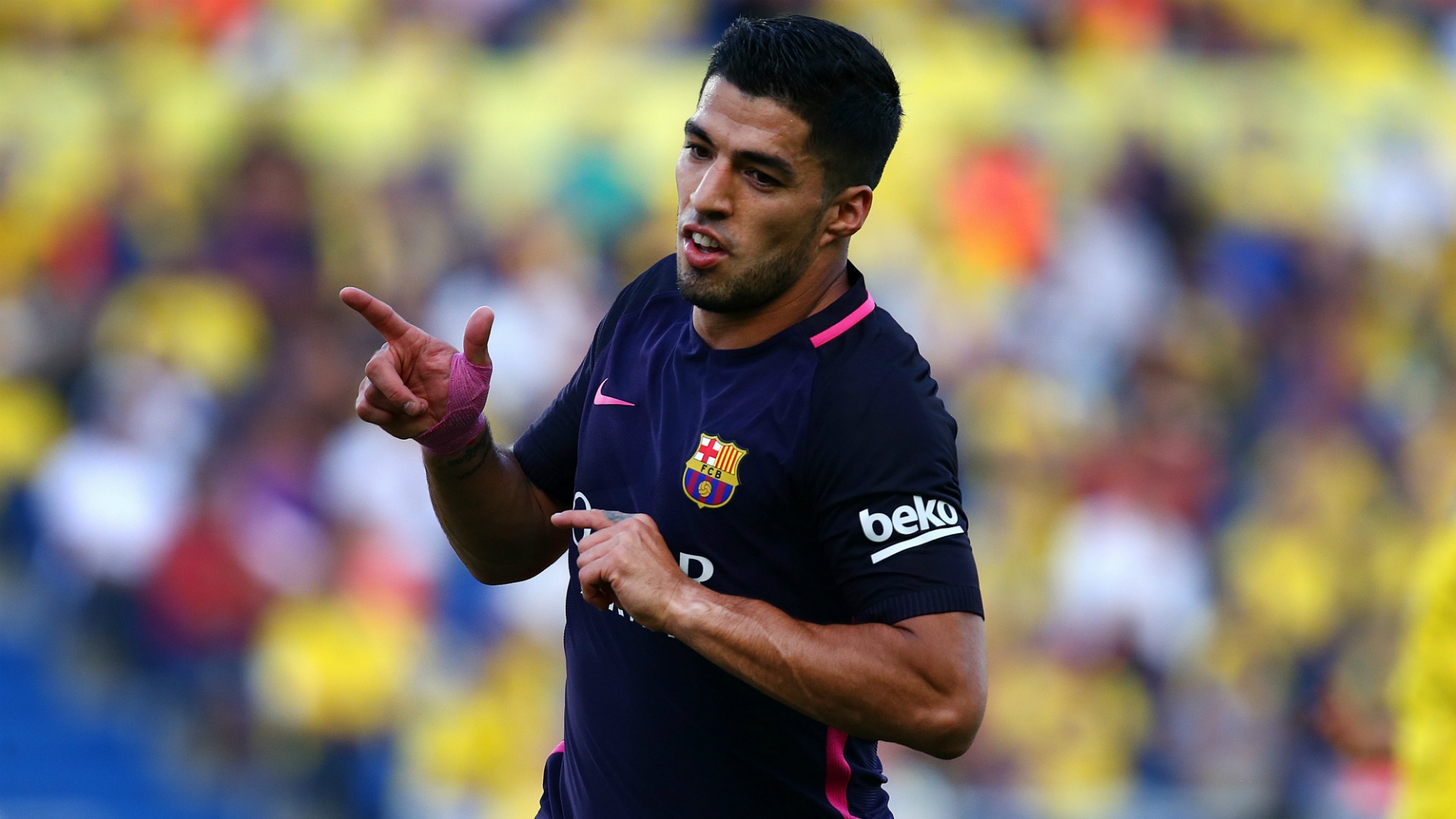 Luis Suarez vows to keep pressure on Real Madrid