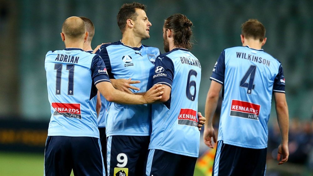 Sydney FC edged a five-goal thriller against Wellington Phoenix. GOAL