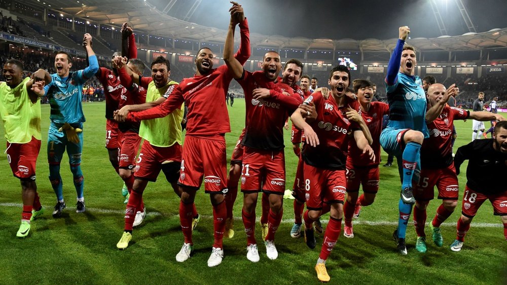Les joueurs de Dijon célèbrent une victoire en Ligue 1 contre Toulouse. AFP