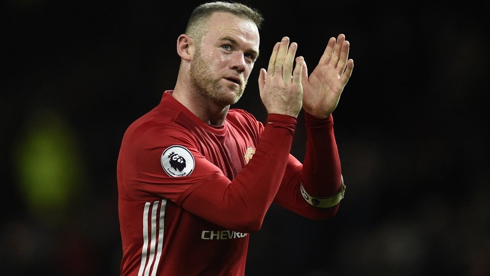 Rooney clapping his hands. Goal