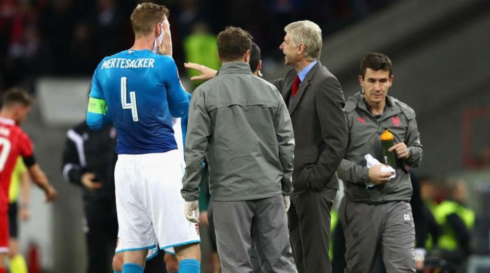Mertesacker paid an emotional tribute to outgoing Arsenal boss Arsene Wenger. GOAL