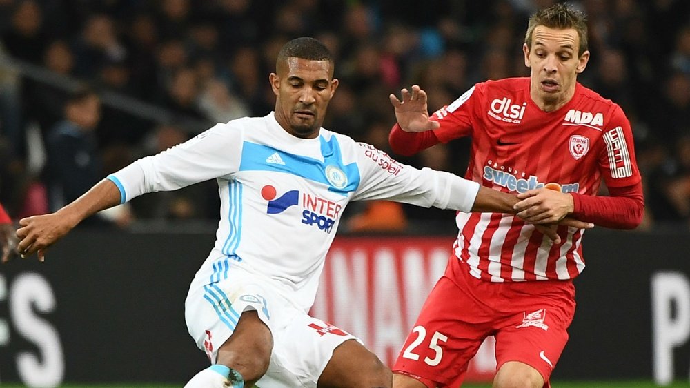 William Vainqueur et Benoit Pedretti dans le match de Ligue 1 entre Marseille et Nancy. AFP