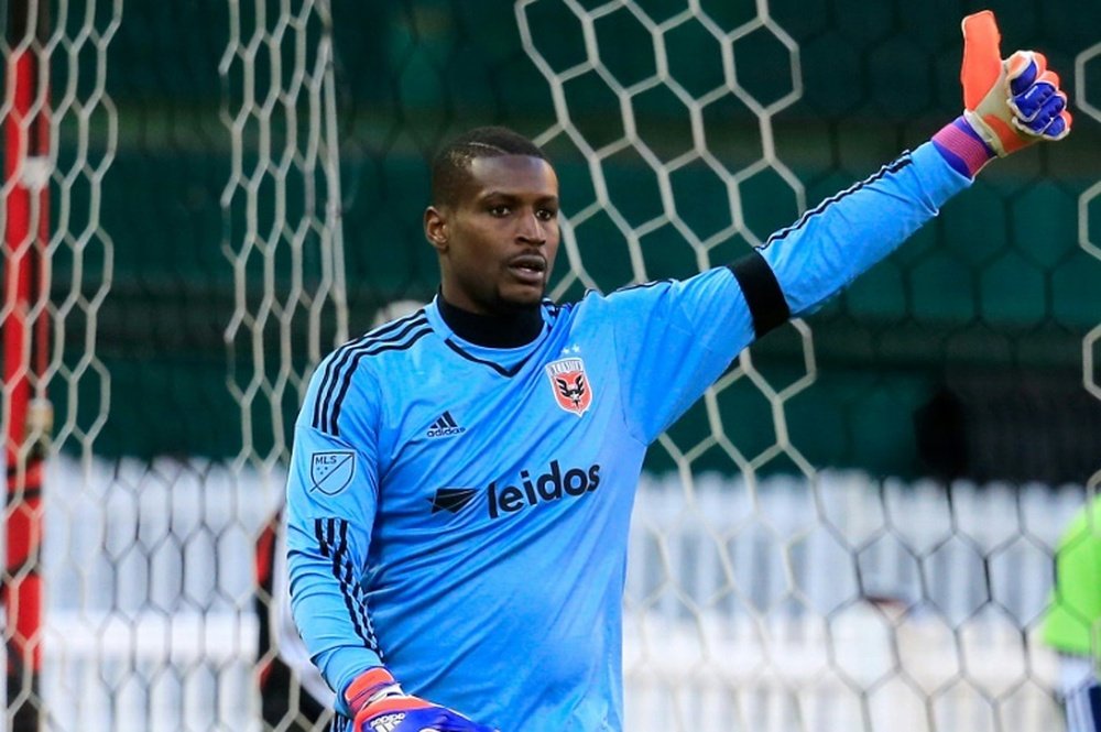 Goalie Bill Hamid of D.C. United celebrates after making a second half stop against the Montreal Impact during their 1-0 win at RFK Stadium on March 7, 2015 in Washington, DC