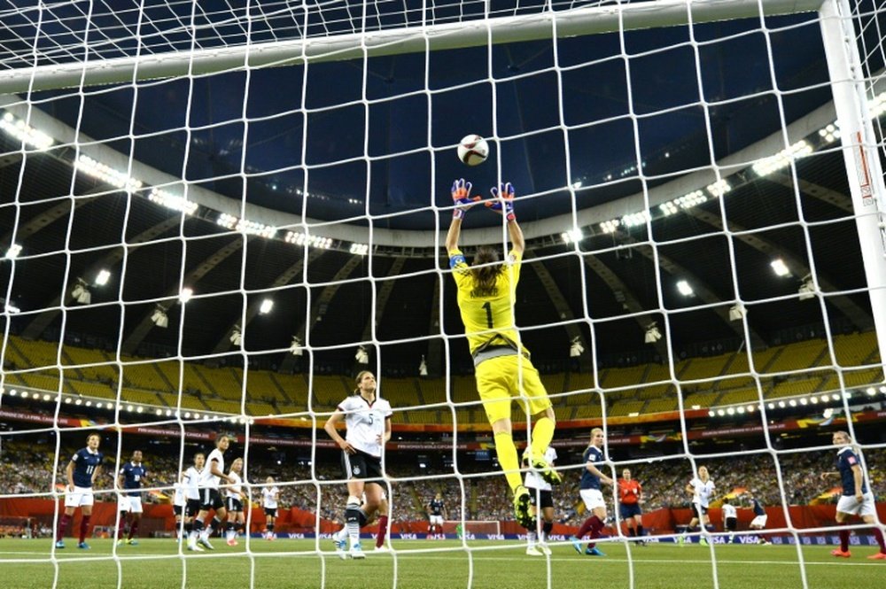 Goalkeeper Nadine Angerer of Germany jumps for the ball during their FIFA Women World Cup quarter-final match against France, at Olympic Stadium in Montreal, Canada, on June 26, 2015