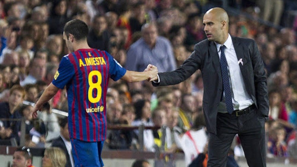 Guardiola is reportedly hoping to lure Iniesta to City. EFE