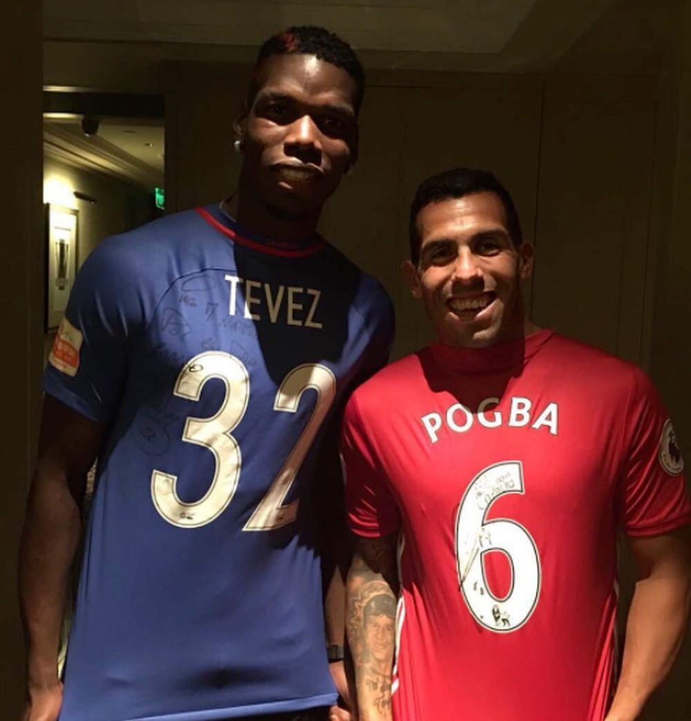 Pogba reunites with Tevez